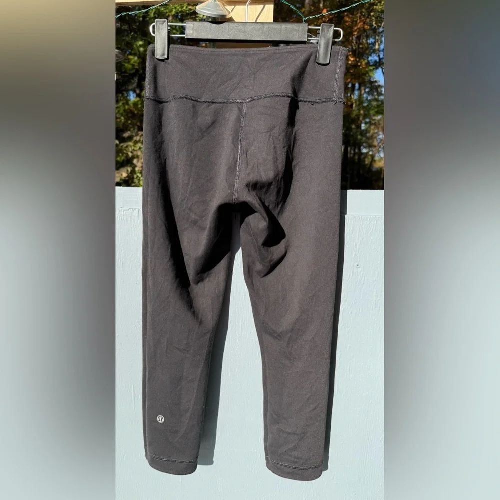 Lululemon Reversible Wunder‎ Under Leggings Size 4 Mauve Black Crop